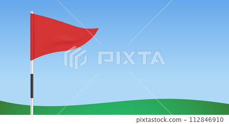 Triangular red flag against a blue sky and green field background Triangular red flag against a blue sky and green field background 112846910