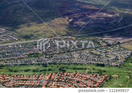 Aerial of Highway, Kapolei homes, golf course, and quarry on Oahu Aerial of Highway, Kapolei homes, golf course, and quarry on Oahu 112849937