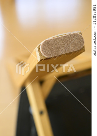 Preventing scratches from chair legs (before and after) 112852981