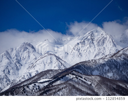 Clear skies and snow in the Northern Alps, Hakuba Village, Nagano Prefecture Clear skies and snow in the Northern Alps, Hakuba Village, Nagano Prefecture 112854859