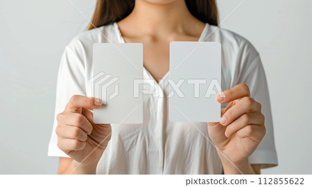 A woman with a white card 112855622