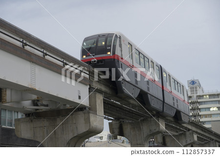 Okinawa, Japan - June 8,2019 : Yui Rail or Okinawa Urban Monorail running on track at twilight in Okinawa, Japan on June 8,2019 112857337