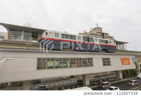 Okinawa, Japan - June 8,2019 : Yui Rail or Okinawa Urban Monorail running on track at twilight in Okinawa, Japan on June 8,2019 112857339