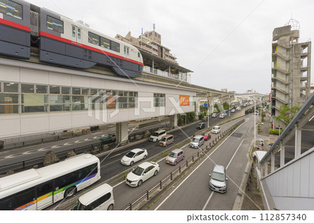 Okinawa, Japan - June 8,2019 : Yui Rail or Okinawa Urban Monorail running on track at twilight in Okinawa, Japan on June 8,2019 112857340