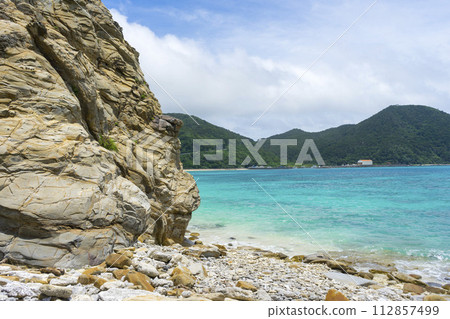 Big rock at Aharen Beach on Tokashiki Island in Okinawa, Japan. Big rock at Aharen Beach on Tokashiki Island in Okinawa, Japan. 112857499