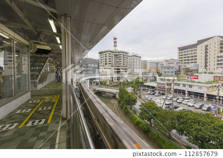 Okinawa, Japan - June 9,2019 : Yui Rail or Okinawa Urban Monorail approaching train station in Okinawa, Japan on June 9,2019. 112857679