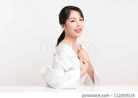 Beautiful young asian woman with clean fresh skin on white background, Face care, Facial treatment, Cosmetology, beauty and spa, Asian women portrait. 112859116
