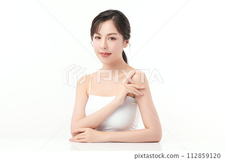 Beautiful young asian woman with clean fresh skin on white background, Face care, Facial treatment, Cosmetology, beauty and spa, Asian women portrait. Beautiful young asian woman with clean fresh skin on white background, Face care, Facial treatment, Cosmetology, beauty and spa, Asian women portrait. 112859120
