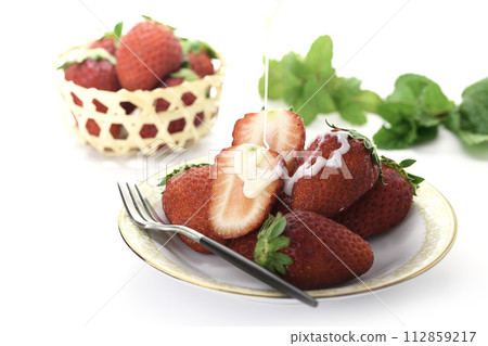 Fresh and delicious strawberry marihime with condensed milk Fresh and delicious strawberry marihime with condensed milk 112859217