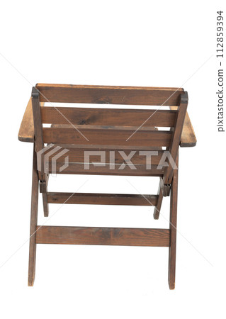 Folding wooden Polish chair from the 1970s and 1980s, rear view. Folding wooden Polish chair from the 1970s and 1980s, rear view. 112859394