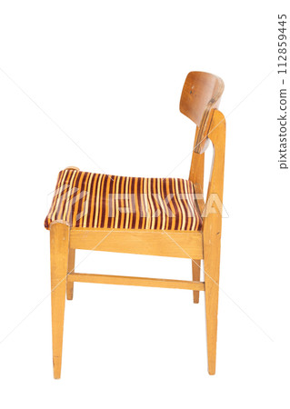 Polish original wooden chair from the 70s and 80s, side view. Polish original wooden chair from the 70s and 80s, side view. 112859445