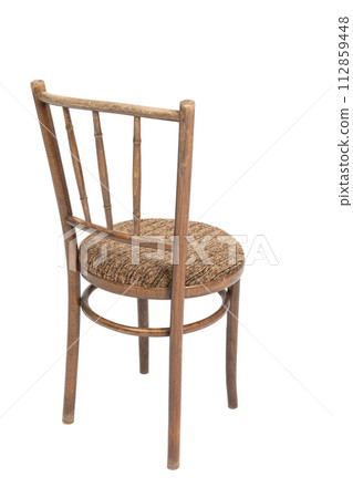 Original wooden chair from 70's and 80's. Polish design and production. Rear angle view. Original wooden chair from 70's and 80's. Polish design and production. Rear angle view. 112859448