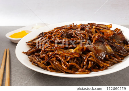 Platter Jjajangmyeon with stir-fried noodles in Jjajang sauce Platter Jjajangmyeon with stir-fried noodles in Jjajang sauce 112860259