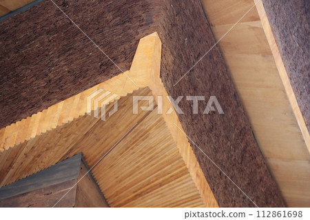 Kyoto townscape, Gion/Higashiyama area, Kiyomizu Temple main hall, zoom of eaves with cypress bark roofing 112861698