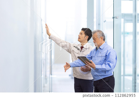 Man in work clothes Real estate developer 112862955