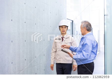 Man in work clothes Real estate developer 112862959