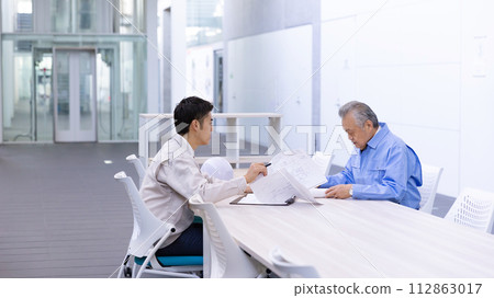 Man in work clothes Real estate developer 112863017