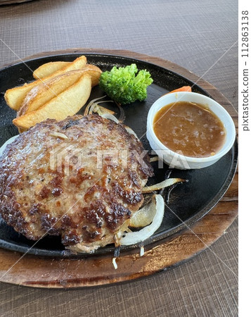 Hamburger steak with golden brown marks Hamburger steak with golden brown marks 112863138