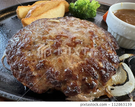 Hamburger steak with golden brown marks Hamburger steak with golden brown marks 112863139