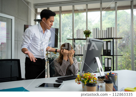 Stressed of female employee and offensive faces that the boss yells, Workplace Conflict, Corporate Communication Problem, stress of business partner discussing, Quarrels, And Bad Attitude At Work 112863335
