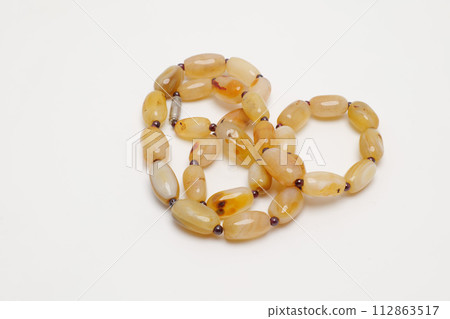 Neck ornament for women made of amber beads. Neck ornament for women made of amber beads. 112863517