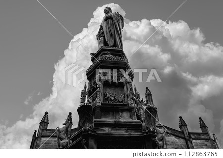 Black and white portrayal of Duke of Buccleuch statue against cumulus clouds in Edinburgh Black and white portrayal of Duke of Buccleuch statue against cumulus clouds in Edinburgh 112863765