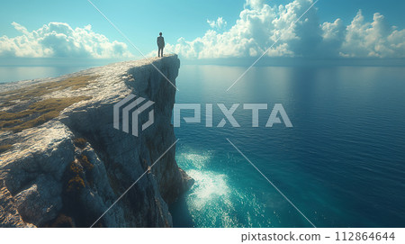businessman standing on the edge of a cliff businessman standing on the edge of a cliff 112864644