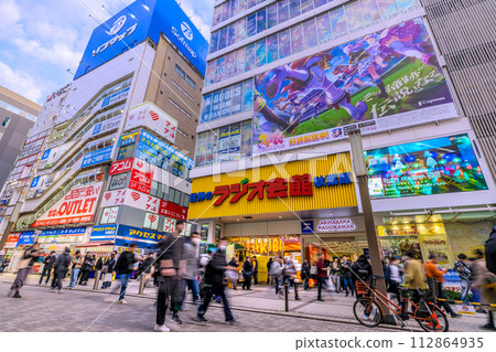 Tokyo, Japan cityscape Bustling Akihabara station front (Hokoten held on Chuo-dori). An abandoned bicycle... 112864935