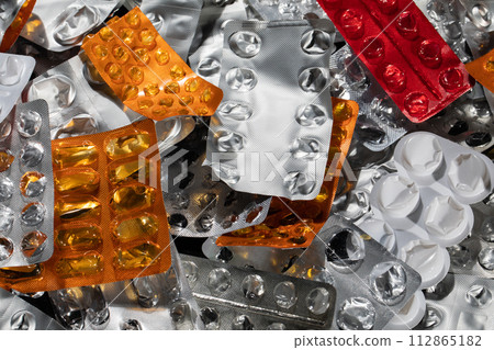 Empty packages of various medicines as a big problem for the natural environment. 112865182