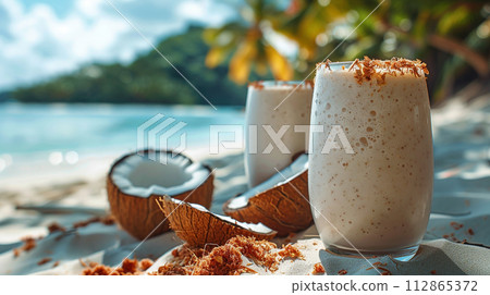 Coconut smoothie on the table with beach background. Summer concept. Summer background. 112865372