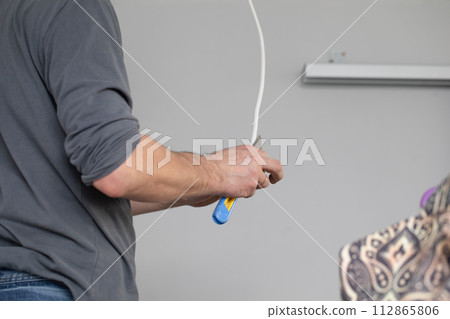 The profession of electrician is one of the most demanding and responsible professions of a construction worker. 112865806