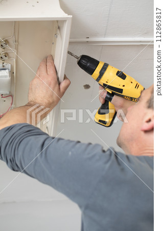 The profession of electrician is one of the most demanding and responsible professions of a construction worker. 112865817