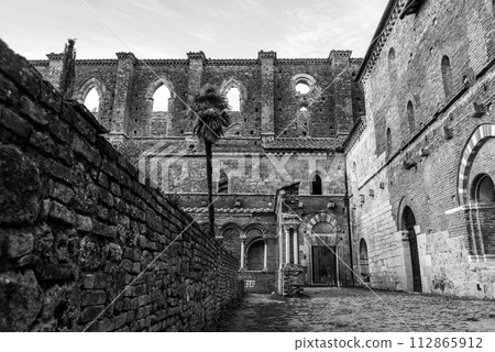 Ruin of the medieval Cistercian monastery San Galgano in the Tuscany 112865912