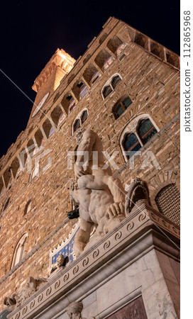 The famous Palazzo Vecchio of Florence illuminated at night 112865968