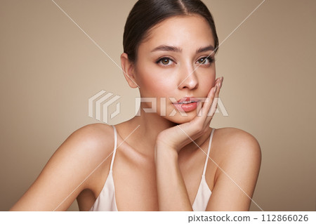 Portrait beautiful young woman with clean fresh skin Portrait beautiful young woman with clean fresh skin 112866026