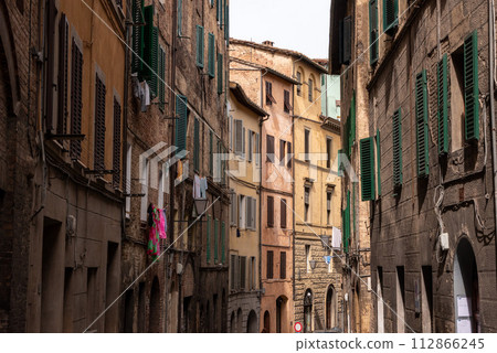 Somewhere in the streets of the old medieval Siena city 112866245