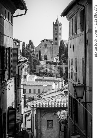Basilica San Clemente in Santa Maria dei Servi seen from the Siena city center Basilica San Clemente in Santa Maria dei Servi seen from the Siena city center 112866275