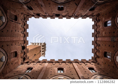 The courtyard of the Palazzo Pubblico in the center of Siena The courtyard of the Palazzo Pubblico in the center of Siena 112866282