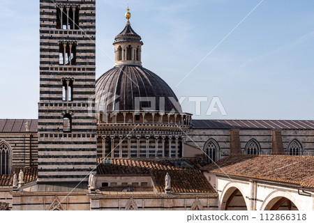 The Siena cathedral and its cupola, seen from the Facciatone panoramic viewpoint 112866318
