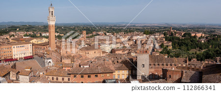 Panoramic view over downtown Siena and the Palazzo Pubblico, seen from the Facciatone panoramic viewpoint 112866341
