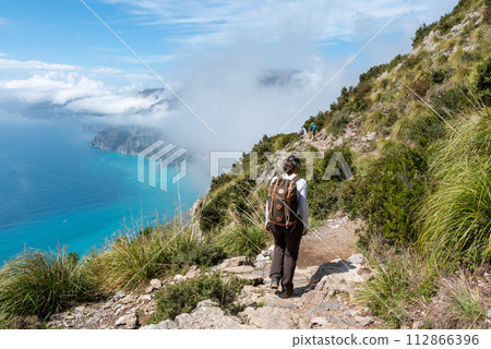 Hiking the famous path Sentiero degli Dei, the path of Gods at the Amalfi coast, Italy Hiking the famous path Sentiero degli Dei, the path of Gods at the Amalfi coast, Italy 112866396