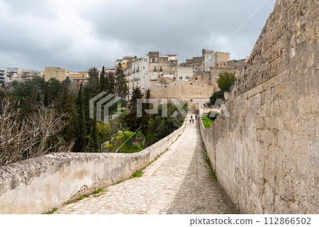 The famous aqueduct bridge from Roman times in Gravina, Italy 112866502
