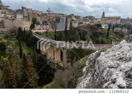The famous aqueduct bridge from Roman times in Gravina, Italy The famous aqueduct bridge from Roman times in Gravina, Italy 112866522