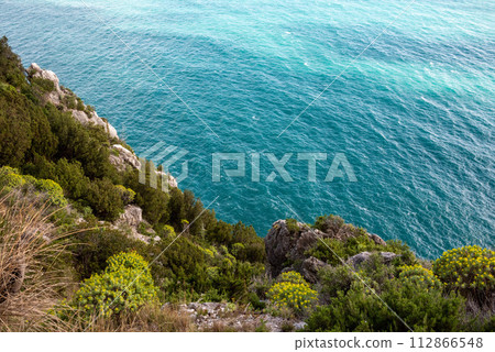 Scenic maritime landscape with cliffs at the famous Amalfi Coast, Italy Scenic maritime landscape with cliffs at the famous Amalfi Coast, Italy 112866548