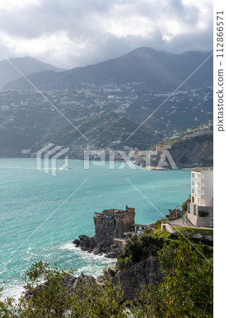 Scenic maritime landscape with cliffs at the famous Amalfi Coast, Italy Scenic maritime landscape with cliffs at the famous Amalfi Coast, Italy 112866571