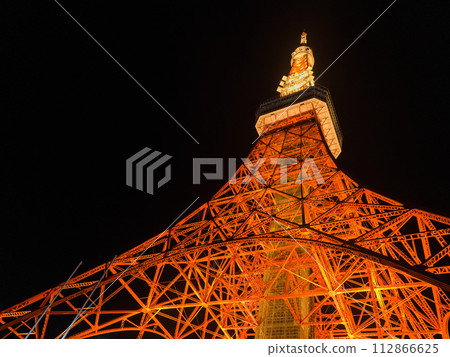 Looking up at Tokyo Tower at night from below Looking up at Tokyo Tower at night from below 112866625