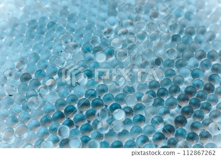 Blue Hydrogel Balls or Aqua Crystal Jelly Soil for Flower or Plant or Home background Blue Hydrogel Balls or Aqua Crystal Jelly Soil for Flower or Plant or Home background 112867262