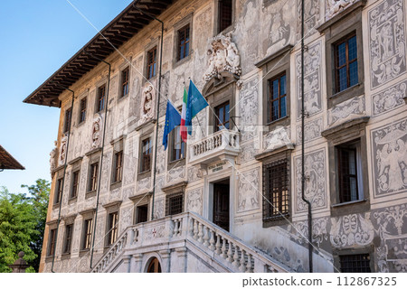 Rich ornate facade of the Palazzo della Carovana in the center of Pisa Rich ornate facade of the Palazzo della Carovana in the center of Pisa 112867325