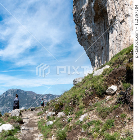 Hiking the famous path Sentiero degli Dei, the path of Gods at the Amalfi coast, Italy 112867584