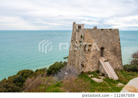 Historic Torre di Monte Pucci, a Saracen signal tower at the coast of Gargano, Italy 112867889